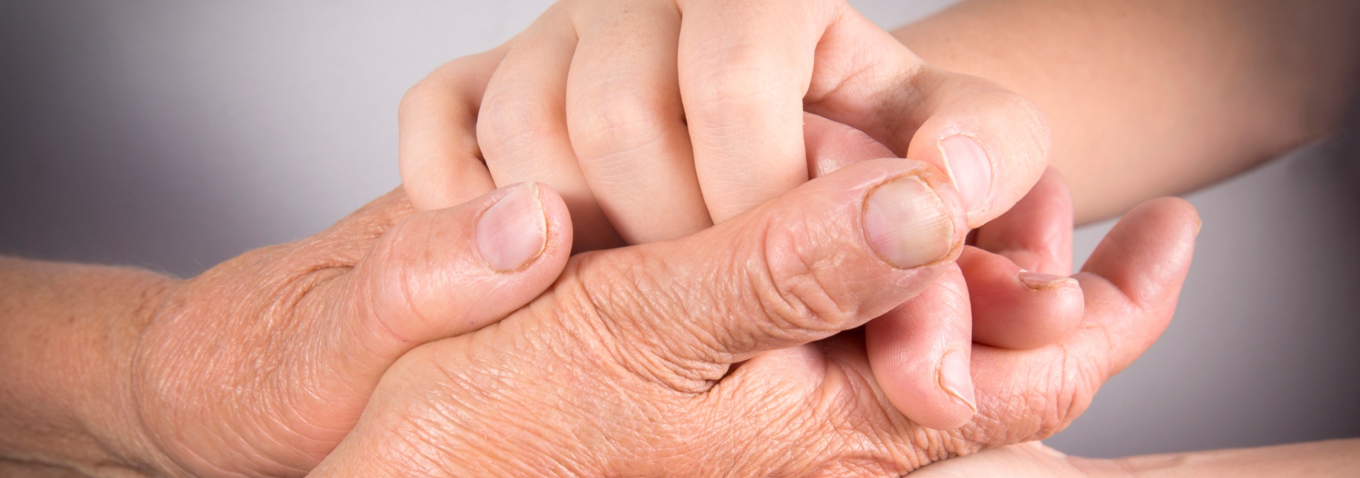 two_hands_holding_for_comfort