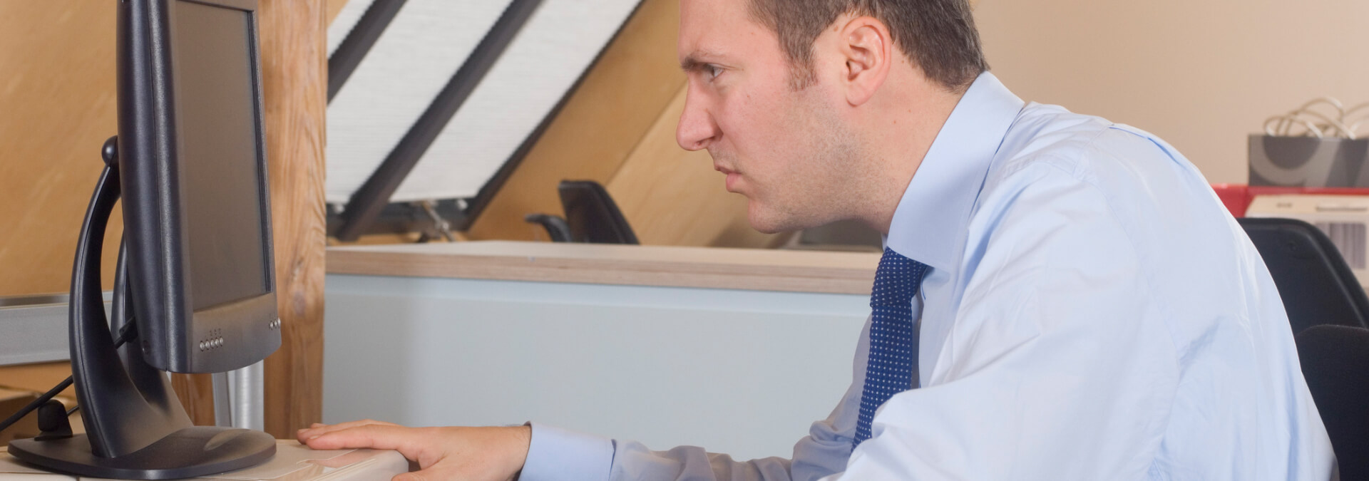 business_man_in_front_of_computer