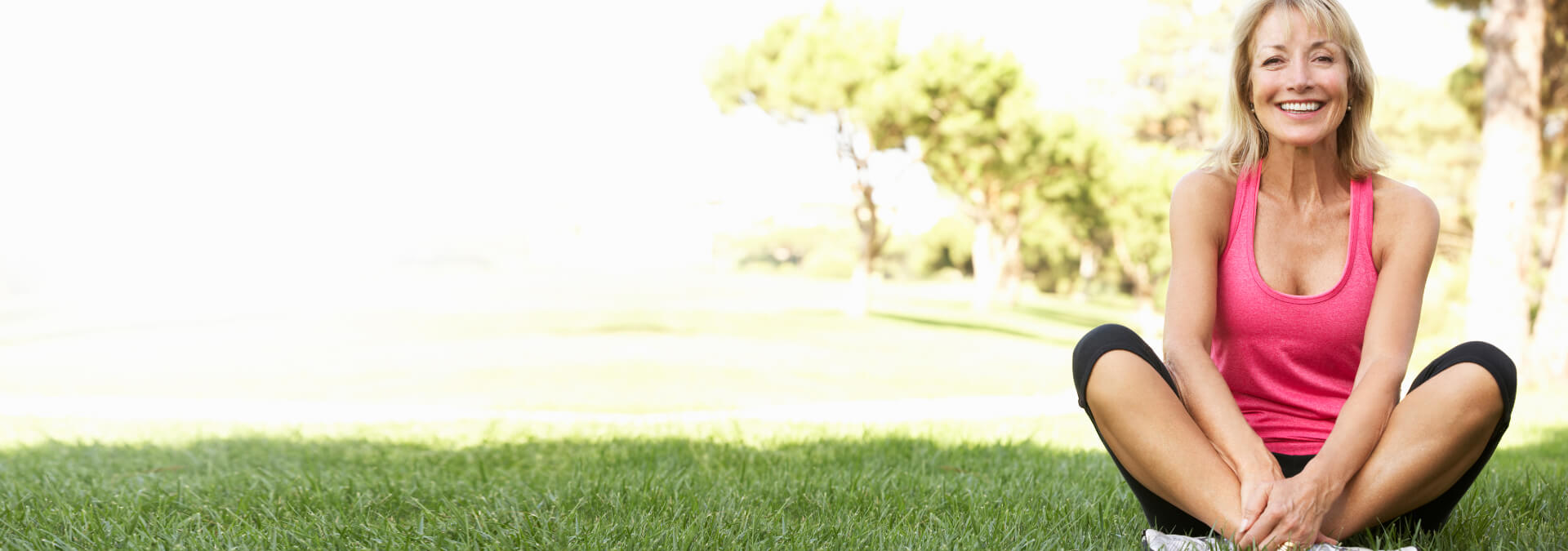 senior_woman_resting_exercise_park.jpg