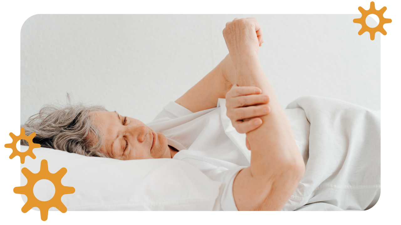 image of middle aged lady examining her arm/elbow