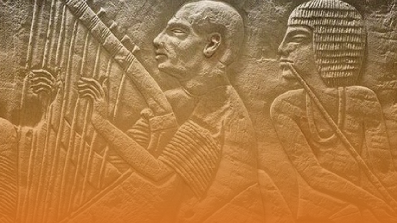 image of stone carving of the Harpist represented in the tomb of Pa-Aton-Em-Heb (1350 BC, 18th Dynasty)