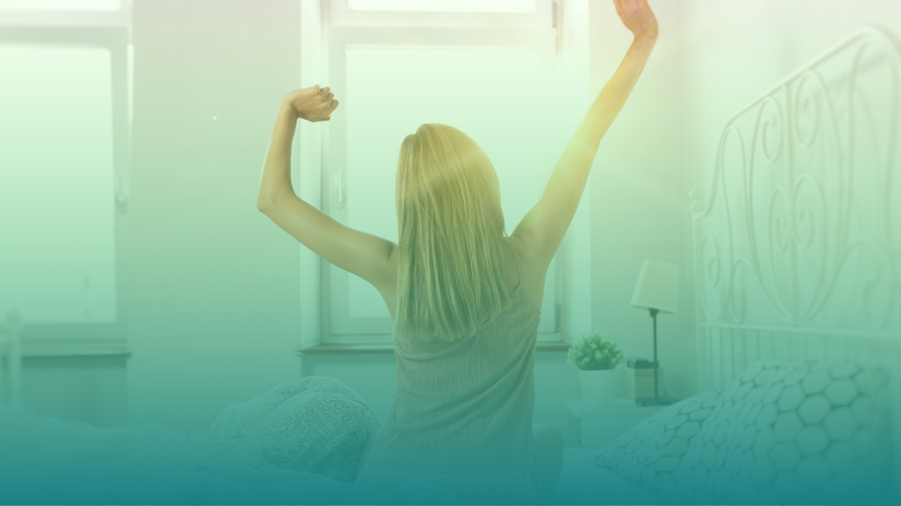 image of woman from behind stretching in morning light